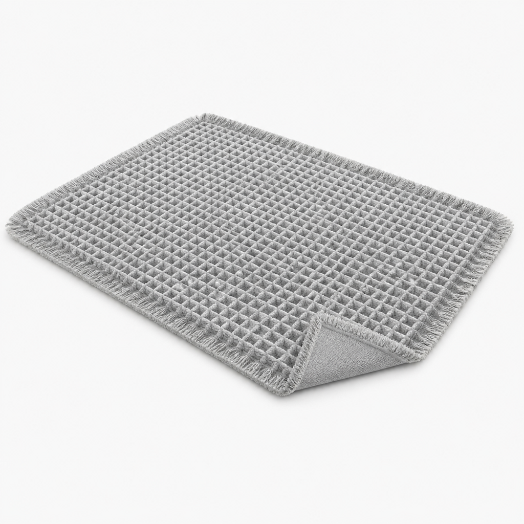Tapis de bain gaufré à franges