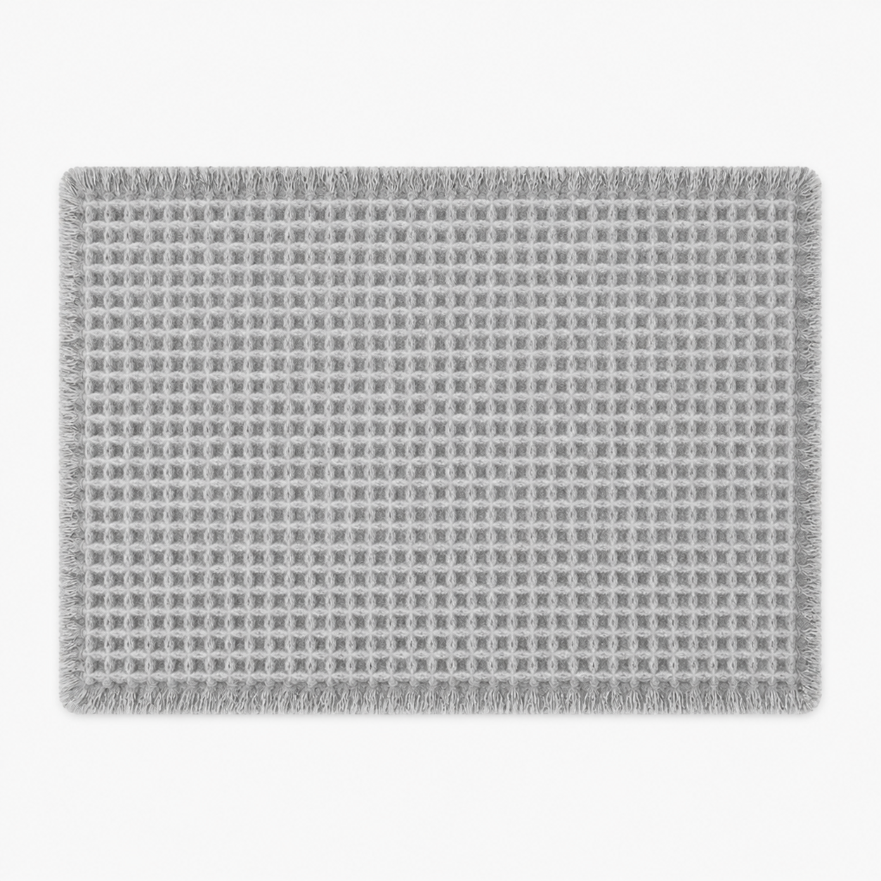 Tapis de bain gaufré à franges