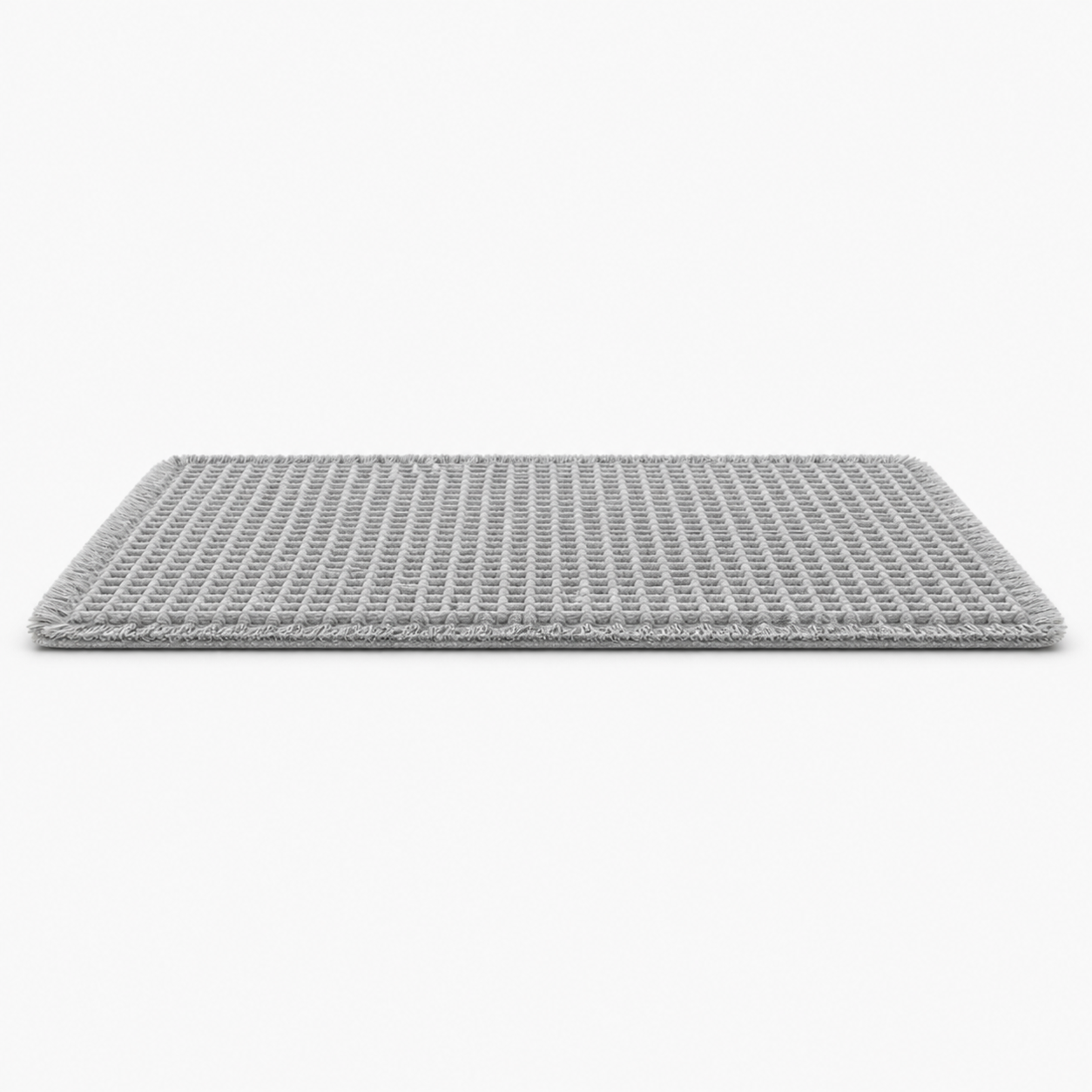 Tapis de bain gaufré à franges