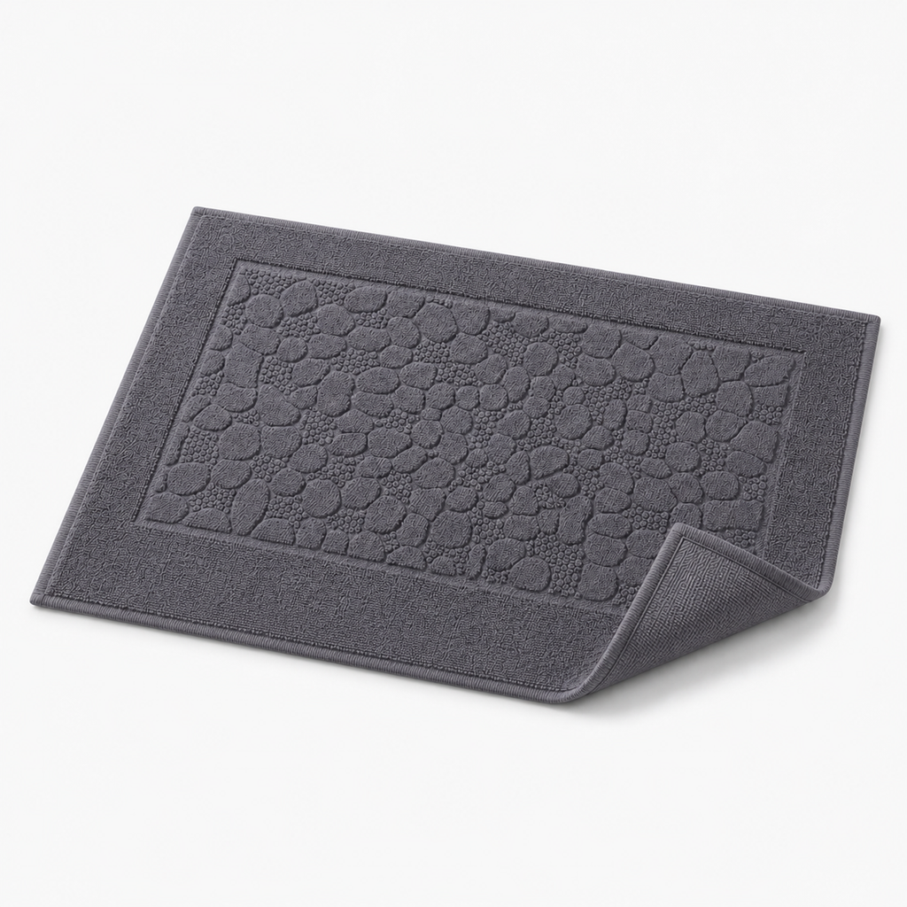 Tapis de bain à relief minéral