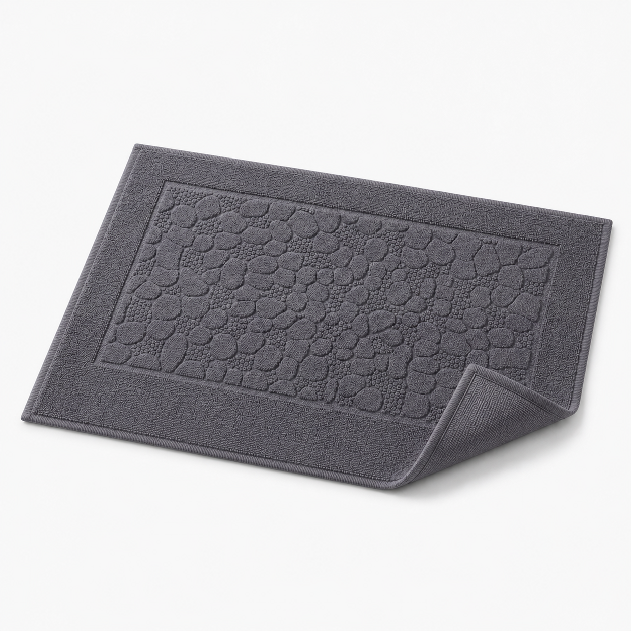 Tapis de bain à relief minéral