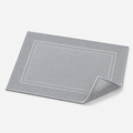 Tapis de bain à double cadre tissé
