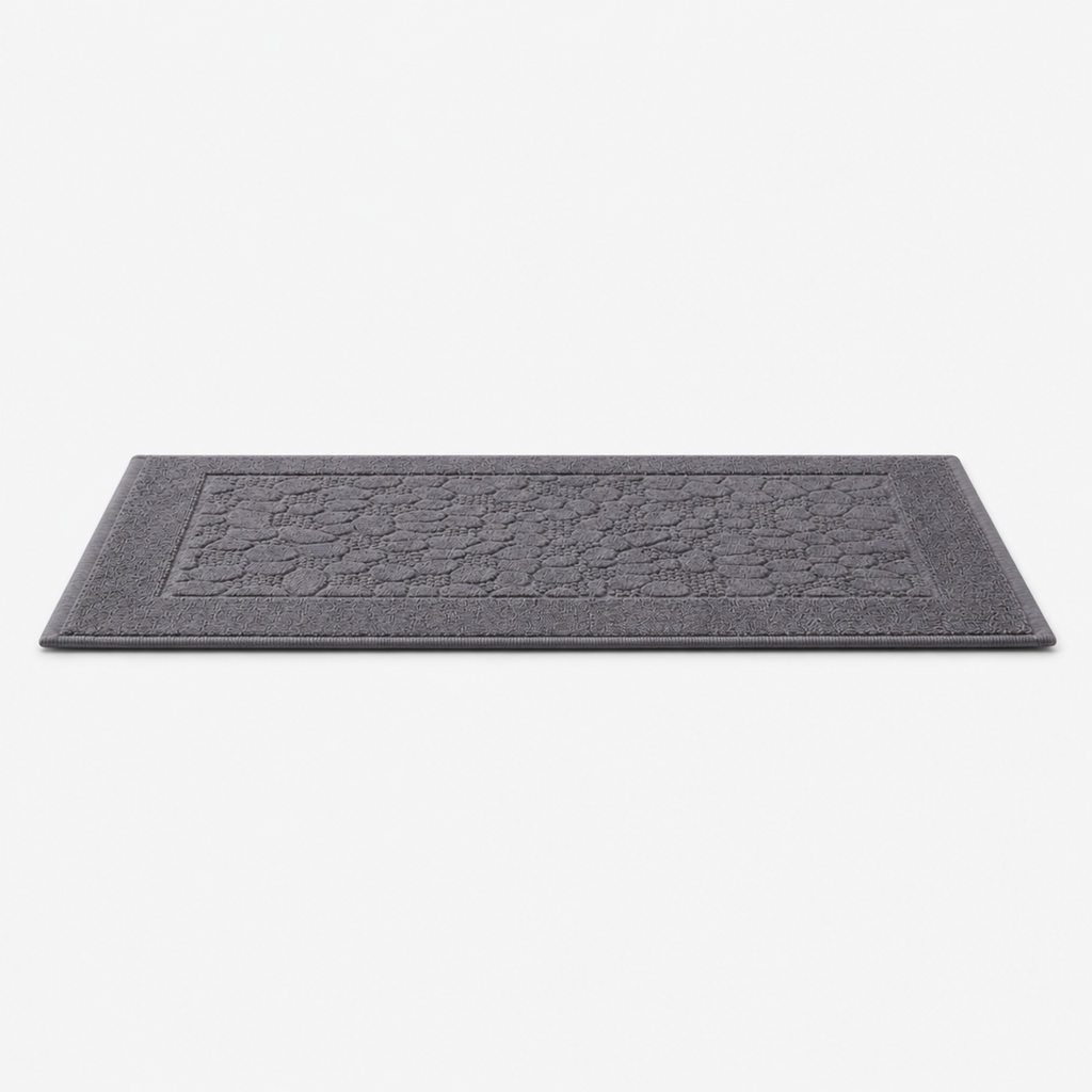 Tapis de bain à relief minéral