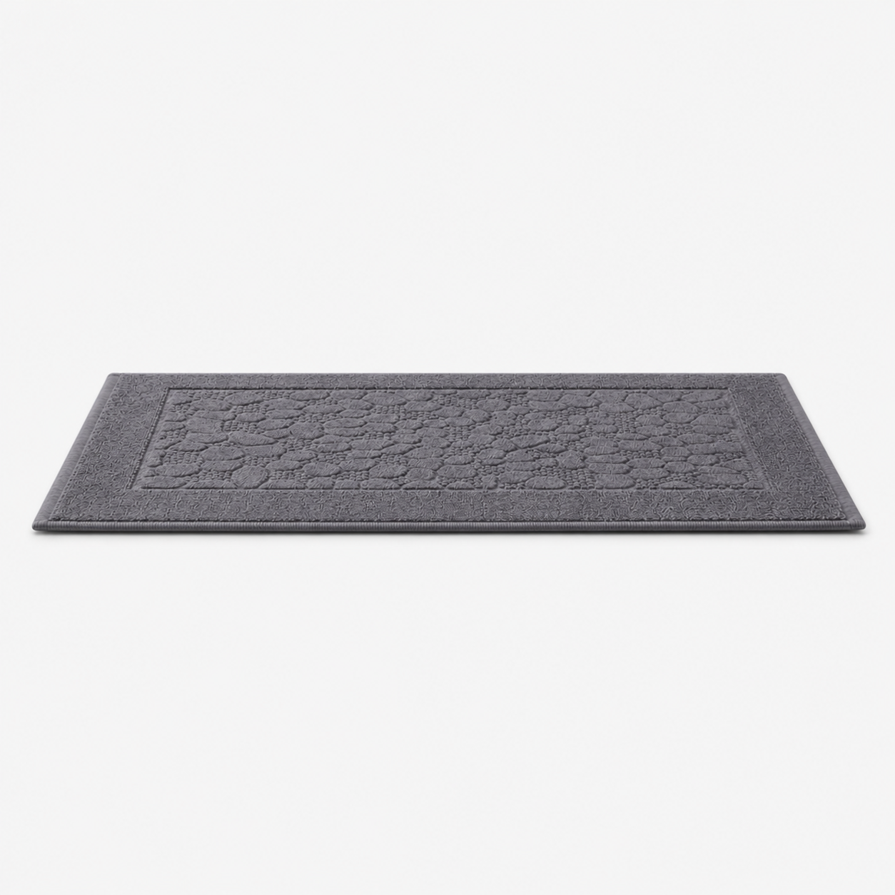 Tapis de bain à relief minéral